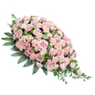 A softly elegant casket spray is shown resting on a white background, its form stretching from a rounded cluster of blooms at the upper left into a slender, tapering point at the lower right, like a gentle, floral sigh. The main flowers are numerous soft pink roses, their velvety petals unfolding in spirals that create a sense of depth and tenderness. Some roses are fully open, showcasing their intricate centres, while others remain in tighter, more modest buds that hint at stories still held close to the heart. Threaded throughout the roses are light peach-pink carnations, their finely ruffled petals adding a delicate, textured layer that makes the spray look both full and softly cushioned. Surrounding these pastel flowers is a generous collar of deep green foliage. Broad, polished leaves provide structure and contrast, while finer, more slender greenery arcs outward and gently trails at the pointed end, giving the whole design a natural, flowing movement. The colours-blush pinks, gentle peaches, and rich greens-appear calm and soothing against the white background, reminiscent of quiet moments in Mill Hill's gardens or the peaceful paths around the local churchyards. The arrangement communicates dignity, kindness, and a quiet strength, making it a fitting tribute for funeral services and memorial gatherings across Mill Hill and the surrounding North London neighbourhoods. It looks like a piece carefully crafted by Flowers Mill Hill, ready to rest atop a casket or be placed beside a memorial book, offering a silent yet eloquent message of farewell, love, and lasting remembrance.