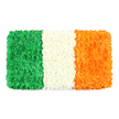 From a sun-warmed corner of Mill Hill, this rectangular floral banner reimagines the Irish tricolour-An Bhratach Náisiúnta-against a clean white backdrop. The composition is a deliberate mosaic of countless fresh petals, arranged into three equal vertical bands with flag-like precision. The left-hand stripe glows in a deep emerald green, a plush carpet of tiny green carnations or chrysanthemums whose slightly uneven surface reveals the individual clusters and the florists' patient hand. This green nods to Irish Catholic heritage and the spirit of nationalism.
To the center, a crisp white band of tightly packed white petals appears soft and cloud-like, catching the light and separating the other colours with quiet dignity. The white stripe's texture is almost tactile in its softness, inviting the eye to linger on the moment of pause between tradition and hope.
On the right, the bright orange stripe mirrors the same careful texture, formed from numerous tiny orange flowers-perhaps marigolds or orange chrysanthemums-that give the stripe a warm, sunlit glow. The entire arrangement sits on a pure white background, the colours luminous and tactile, a handcrafted celebration of culture and craft. For a Mill Hill audience, the flag evokes St Patrick's Day, community gatherings, and quiet moments of reflection in local churches and markets around Mill Hill Broadway and Copthall Playing Fields. Made by Flowers Mill Hill, this tribute blends traditional symbolism with contemporary floristry, offering a visually striking piece for articles about Irish identity, national holidays, or the symbolism of colour in nature.