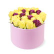 In a bright, uncluttered white studio, this modern floral gift from Flowers Mill Hill presents a cylindrical pastel pink box with a smooth matte finish and a sculpted curved front that opens to reveal a dense, sunlit bouquet. The arrangement within is built around a tight core of soft yellow blooms, each petal gently unfurled to catch the light and create a warm, optimistic glow. These cheerful yellows form a rounded silhouette, giving the bouquet a contemporary, architectural look that feels fresh and uplifting. Woven through the yellow sphere are deeper burgundy or purple roses, small yet decisive accents that add depth, luxury, and a sense of quiet drama to the design. The overall effect is a balanced harmony of soft pastel and rich jewel tones, set off by the clean white background that makes every petal glow. The box's soft-touch material and the rounded edges contribute to a premium, gift-ready presentation that works beautifully for Mill Hill deliveries, whether for birthdays, congratulations, or a thoughtful gesture that brightens the day. The image captures a stylish approach to gifting, one that suits modern interiors and celebratory moments alike, and it hints at same-day delivery across Mill Hill and surrounding streets. The bouquet feels crafted with intention, a small but radiant celebration that brings warmth without loud excess, perfect for sending a note of cheer to a friend or loved one in NW7.